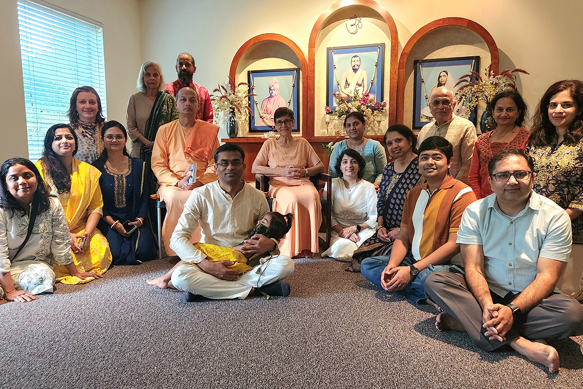Group with Holy Trio shrine